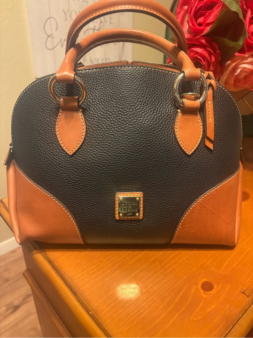 Dooney & Bourke Black and Tan Pebble Leather Dome Satchel